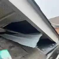 Raccoon-entering-from-dormer